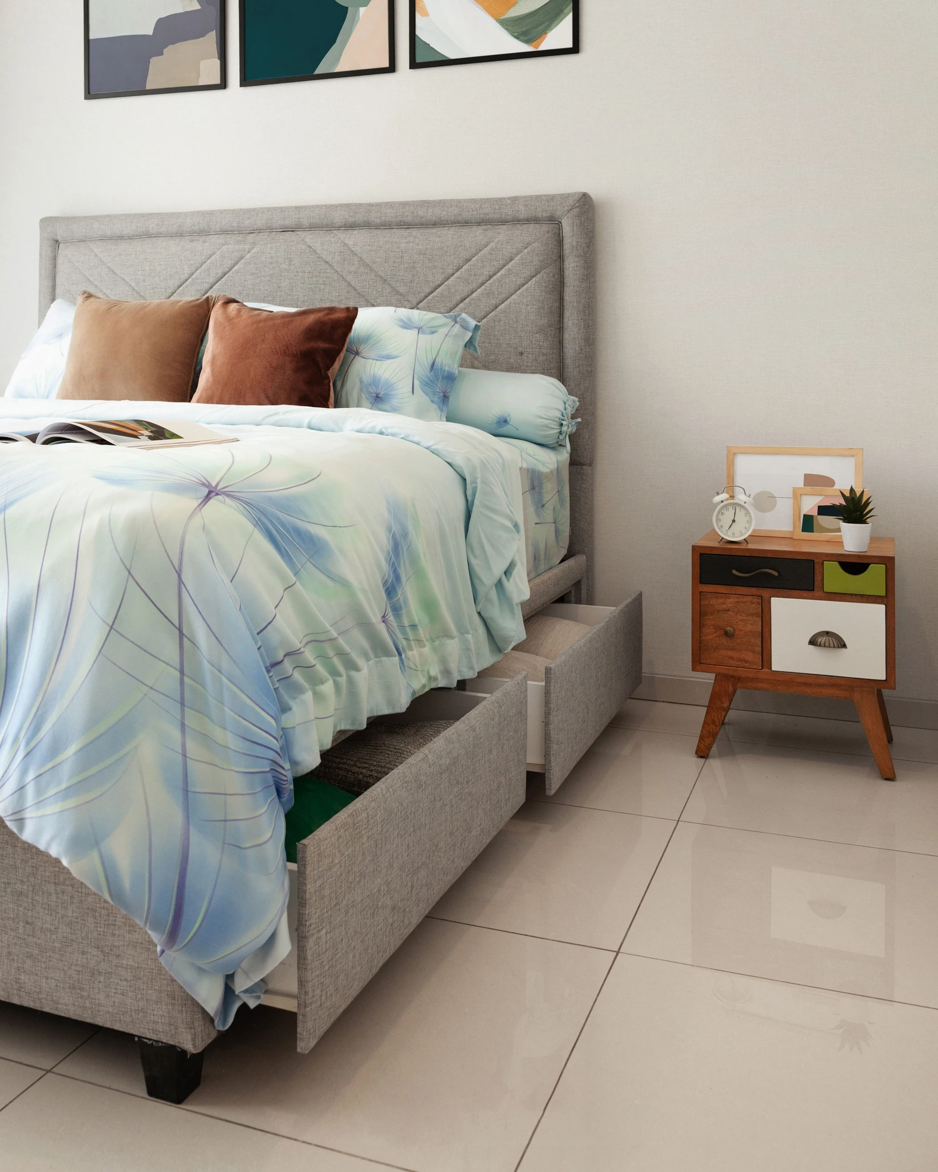 A bed with storage drawers; illustrates access space, not a reviewed storage product.